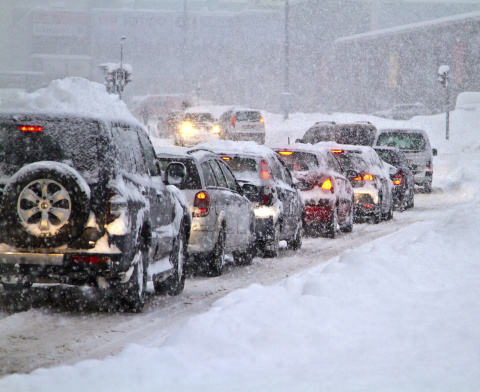 Cars Driving in Blizzard