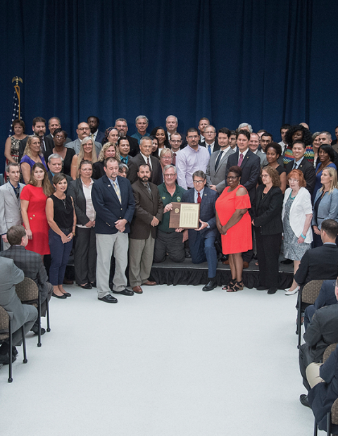 Secretary Perry presents the honor awards