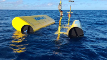 Image of C-Ray's SeaRAY device floating in the open ocean. 