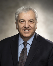 A man looks at the camera.