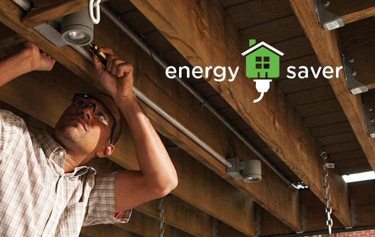 Photo of a man doing electrical work.