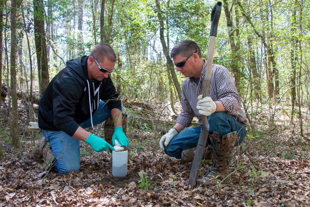 Techs Taking a Sample