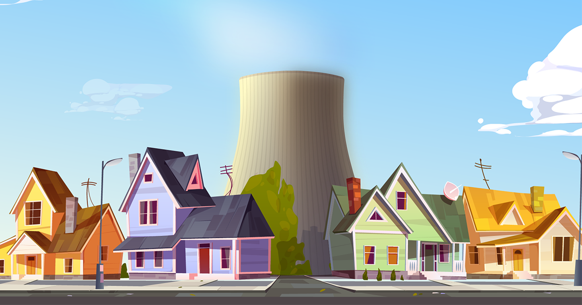 Cooling tower surrounded by local homes.