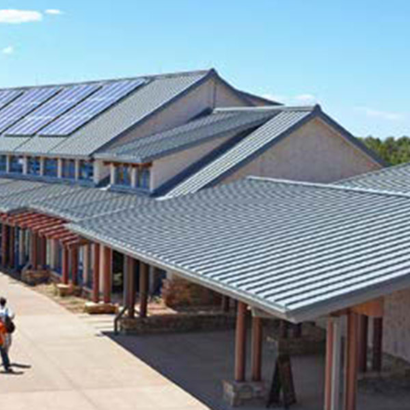 Aerial view of PV panels on the roof of the Grand Canyon Visitor Center.