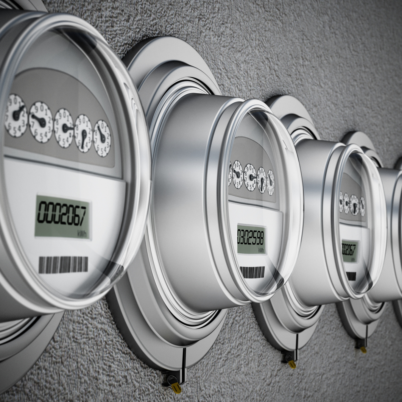 A row of shiny metal electric meters mounted to a wall.