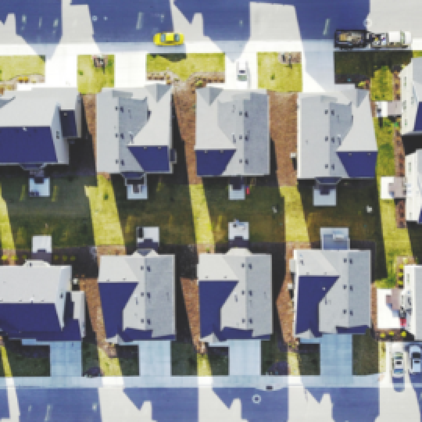 Overhead photo of rows of houses in a neighborhood.