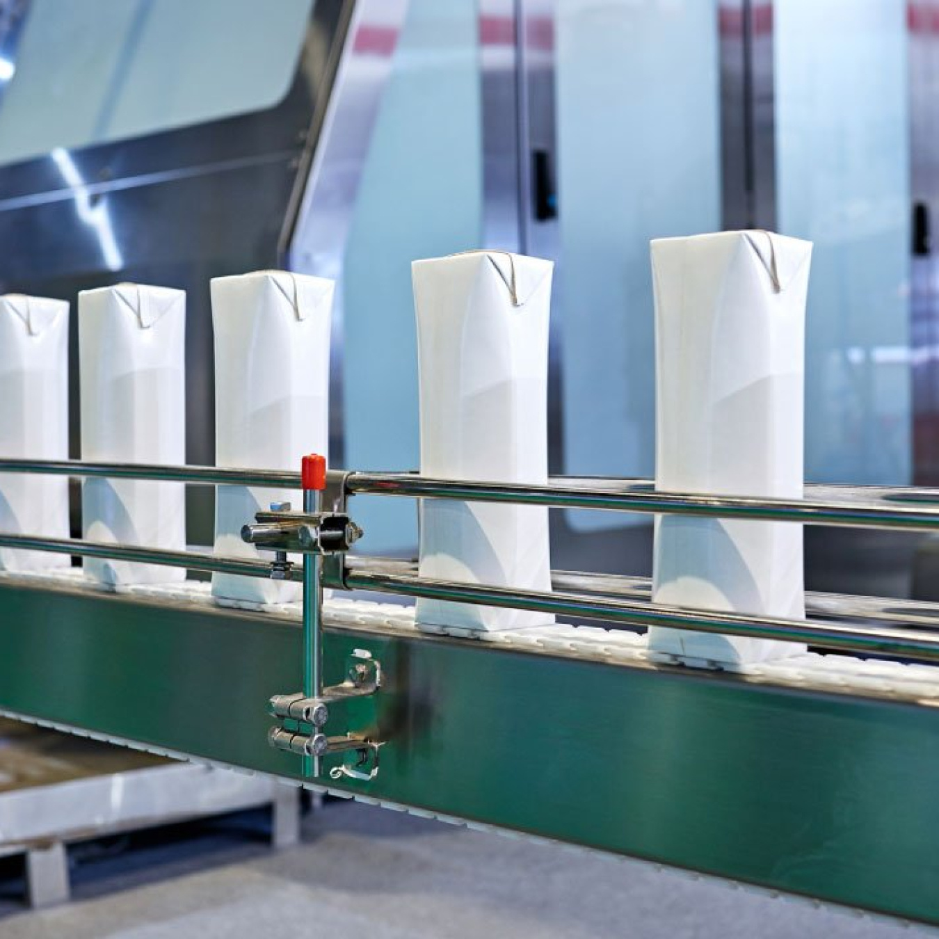A conveyer belt carrying food packaging