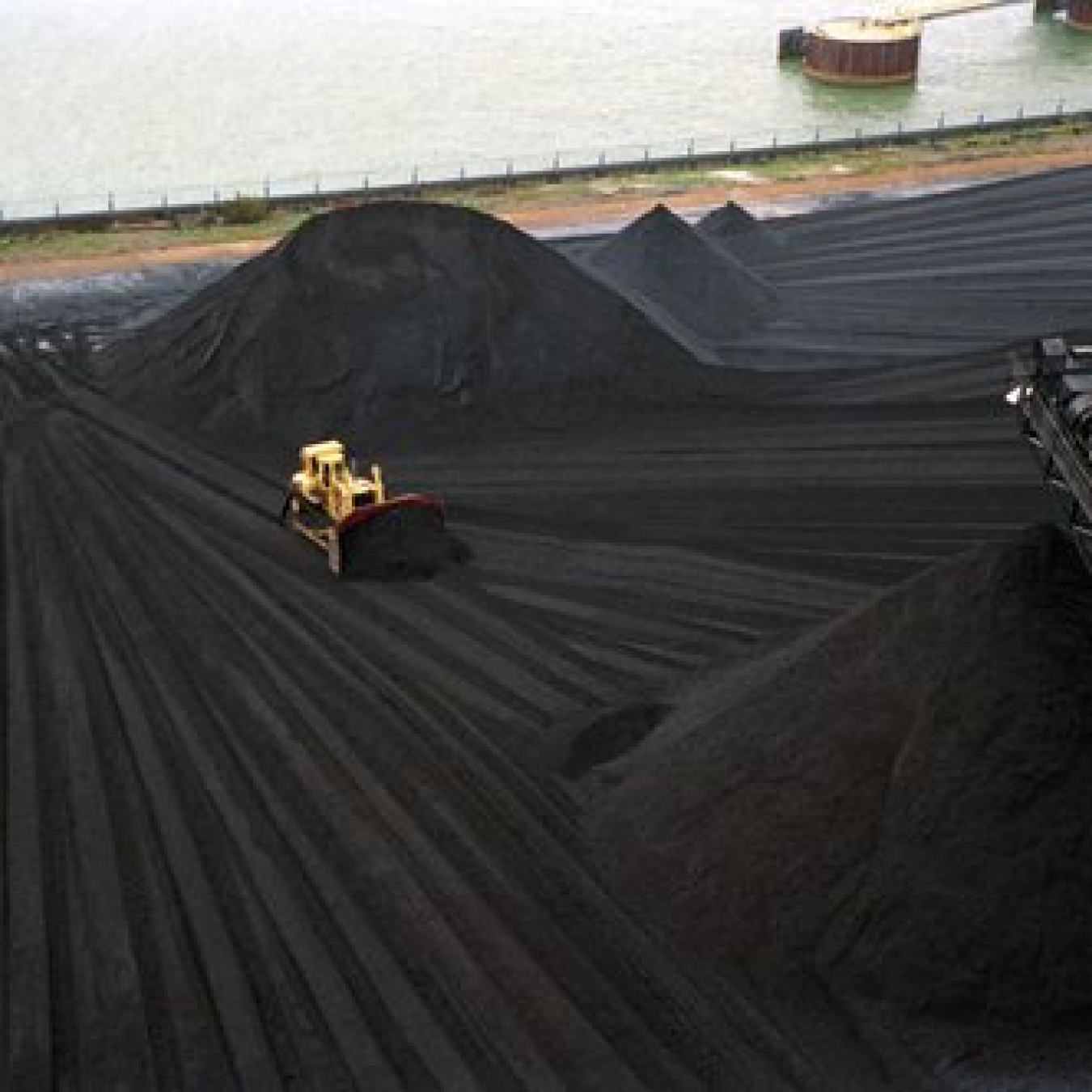front loader piles coal
