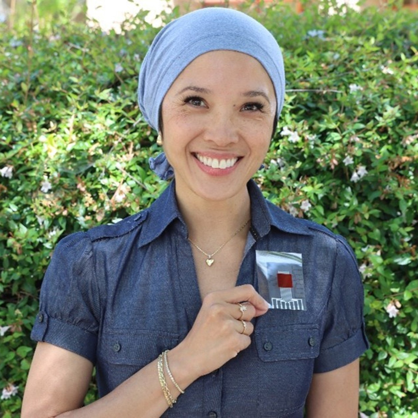 Person wearing a clear patch in which sensors are visible.