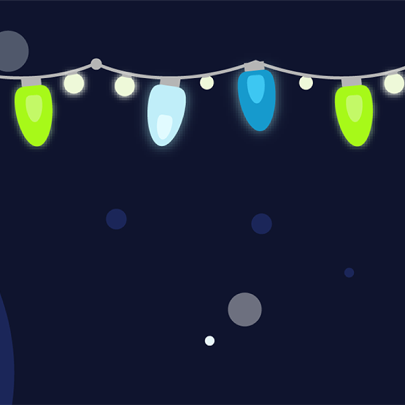 Green and blue holiday lights against a blue background