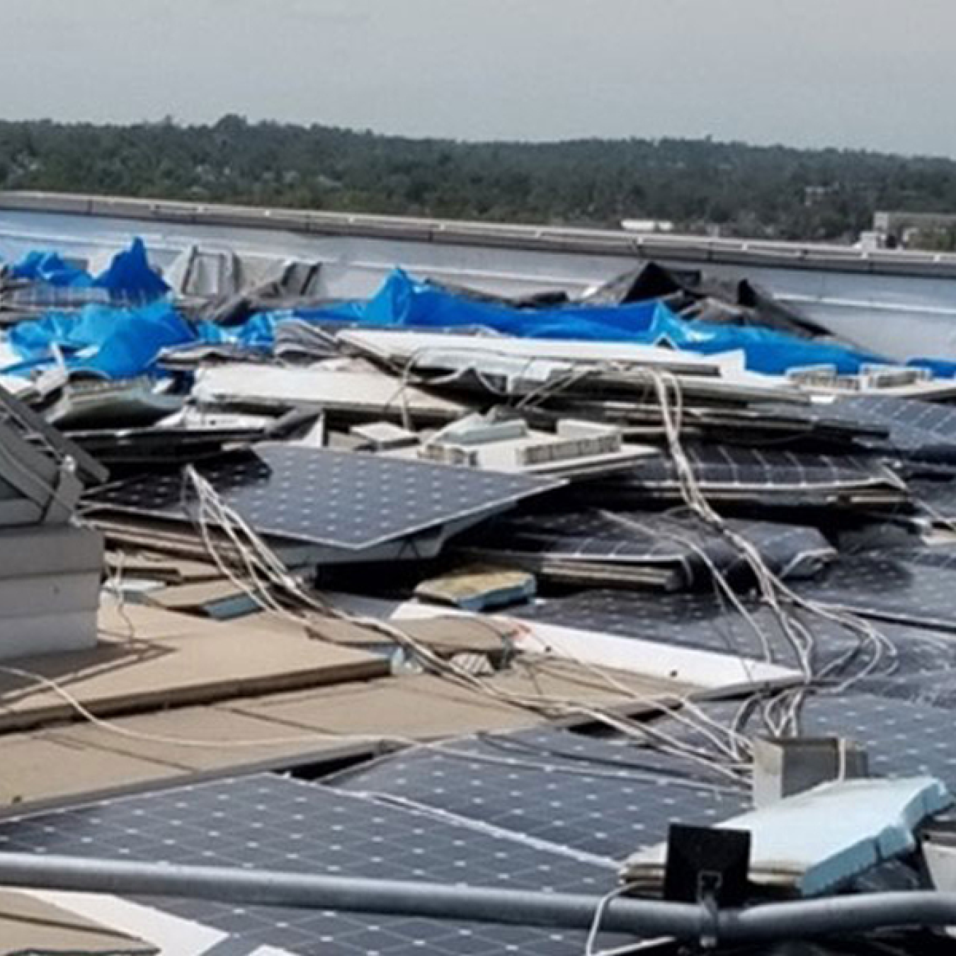 Several solar panels broken due to storm damage.