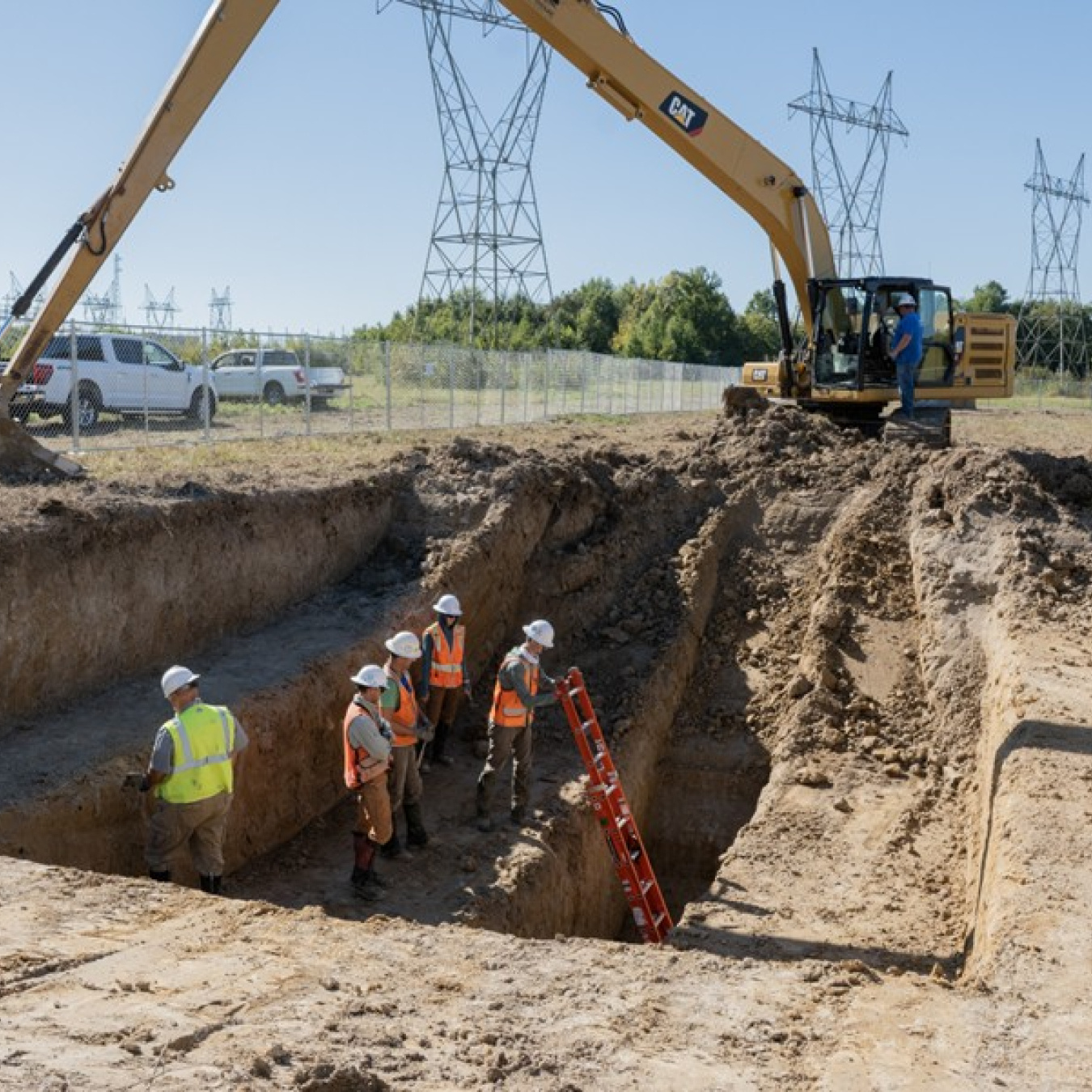 Workers conducting work inside a trench at the Paducah site