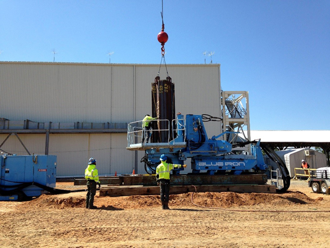 Workers install the sheet piling as part of the Salt Waste Processing Facility tie-in to the liquid waste facilities.