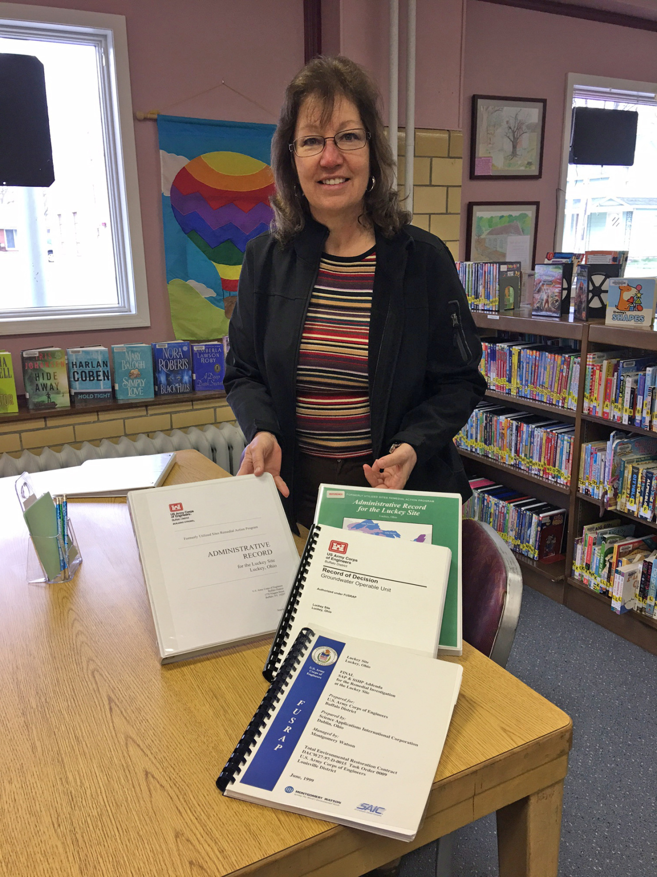 LM Site Manager Gwen Hooten views the Luckey, Ohio, Site administrative record at a public library during her site visit in May 2017.