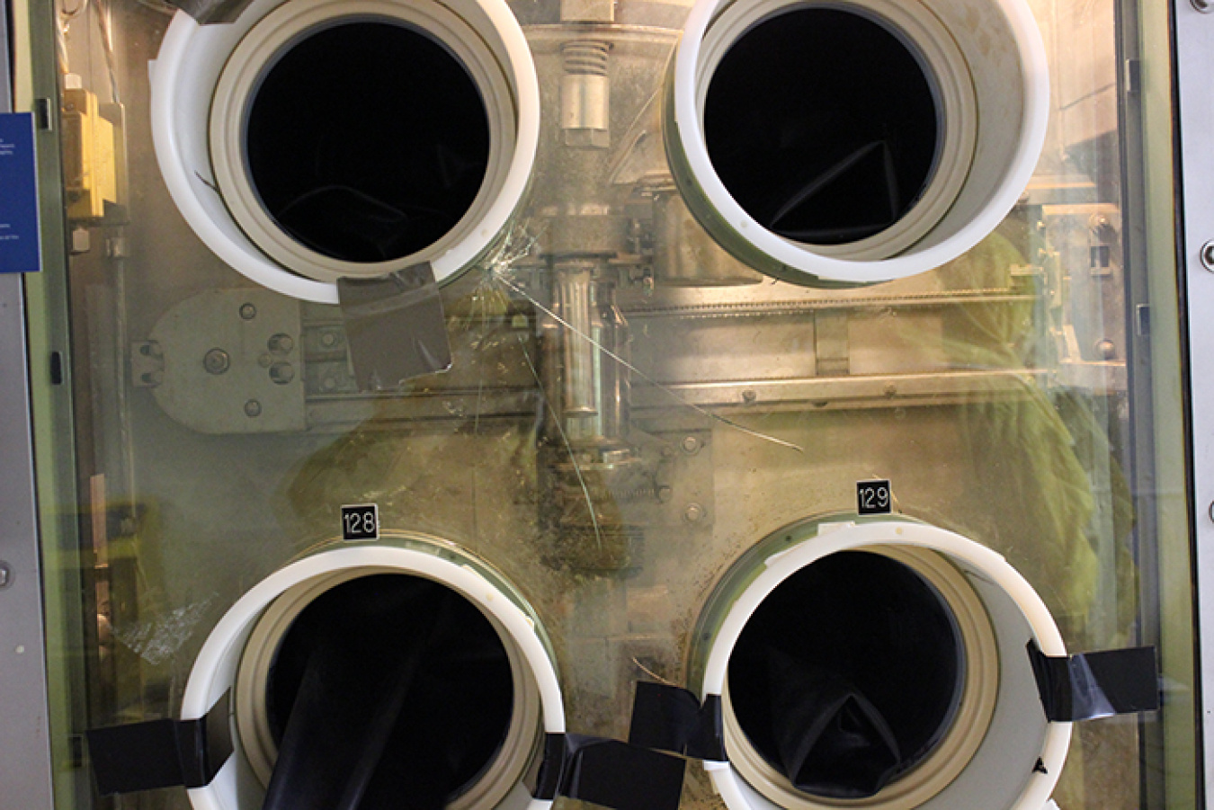 Workers replaced the HB Line Operational Area 5 glovebox panel.