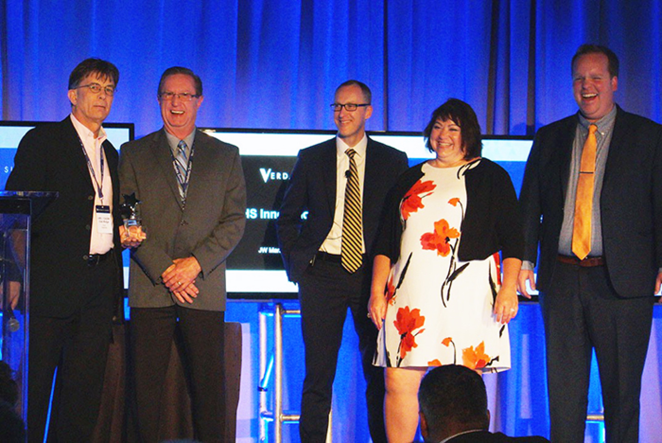 URS | CH2M Oak Ridge LLC’s Gary Kephart and Bill Evans accept the Innovation Award from the event hosts.
