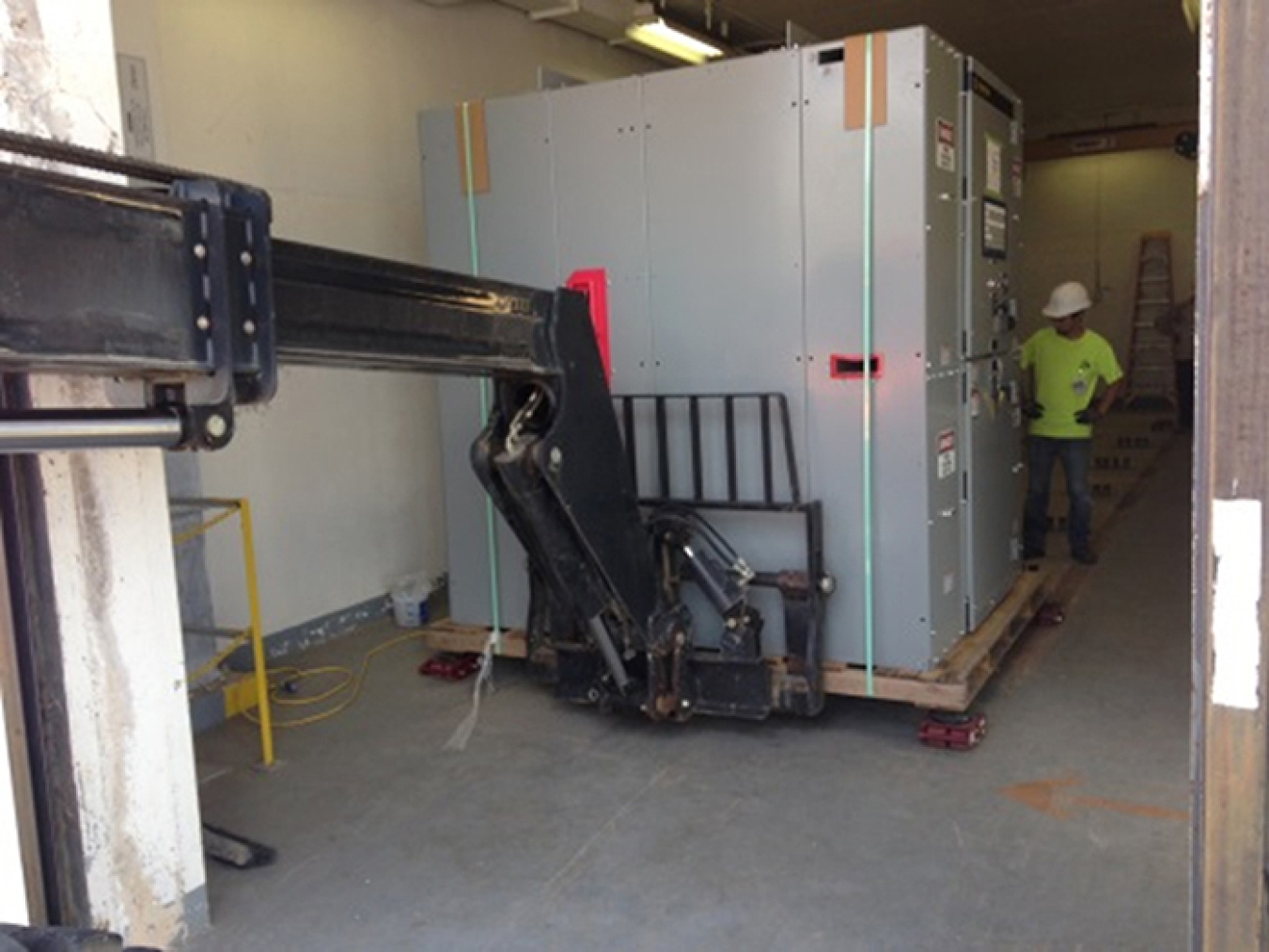 Savannah River Nuclear Solution employees install a new 13.8-kilovolt switchgear in Building 151-1L.