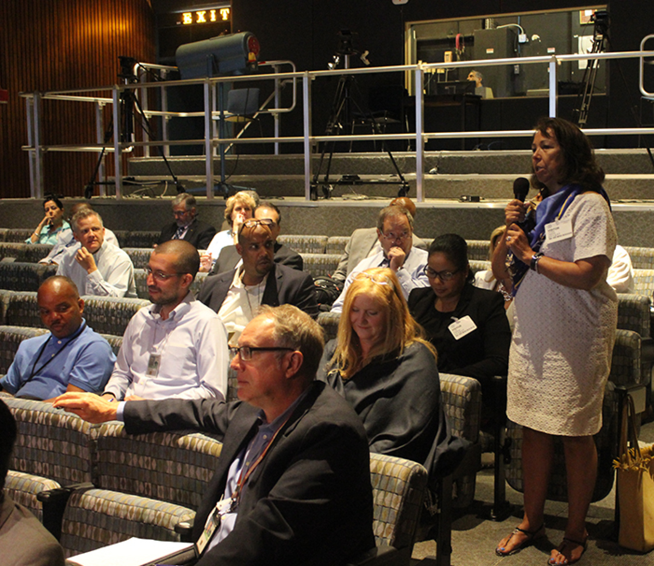 Vicki Vasques, president and CEO of Tribal Tech, LLC, an American Indian, woman-owned small business, asks Norbert Doyle, EM Acquisition and Project Management Associate Deputy Assistant Secretary, a question.