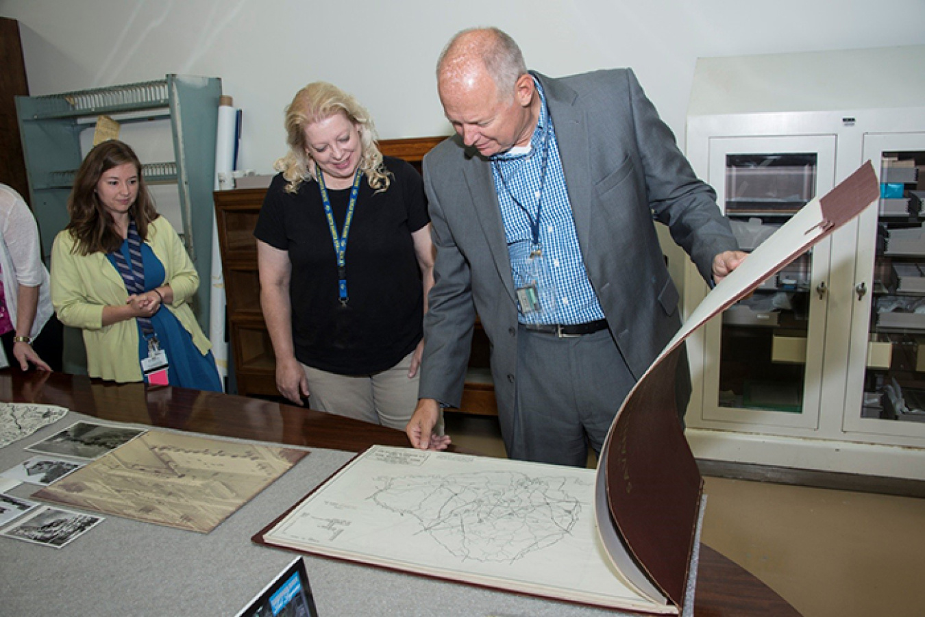 Charboneau and Craig view the original plant map.