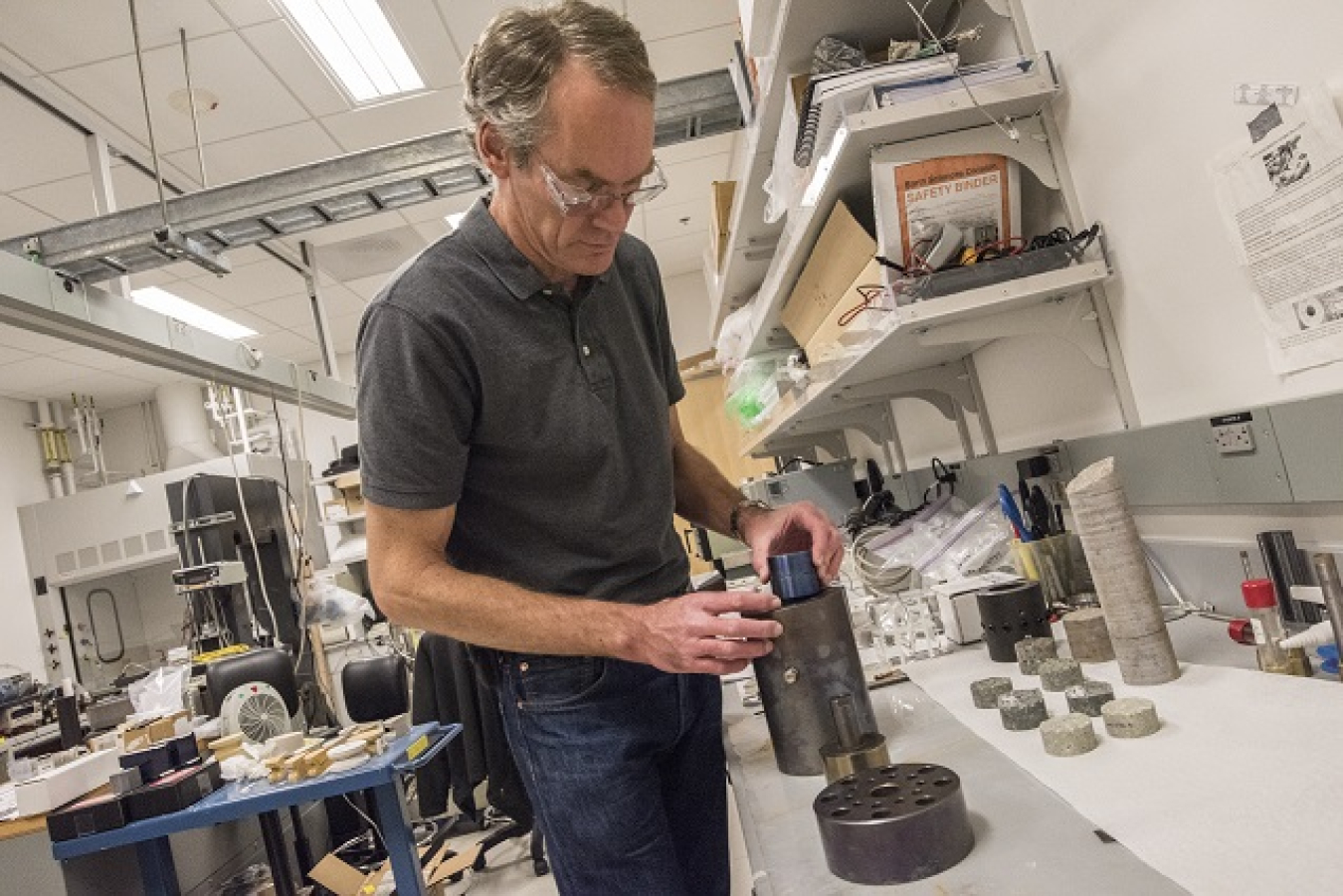 Photo of a man working in a lab.