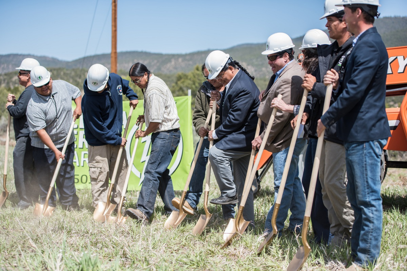 People shoveling dirt.