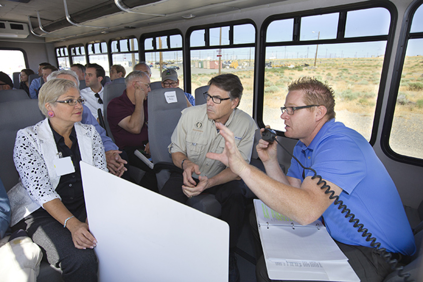 EM Richland Operations Office Deputy Manager Tom Fletcher, right, briefs Energy Secretary Rick Perry while on a tour of the Hanford Site.