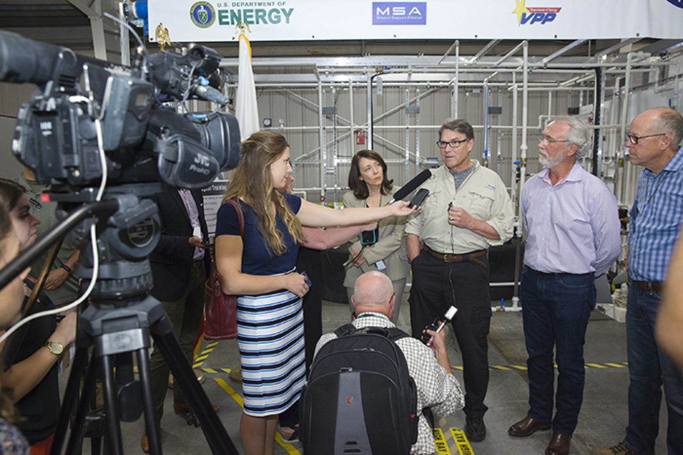 Energy Secretary Rick Perry talks with reporters following briefings and equipment demonstrations at the Volpentest Hazardous Materials Management and Emergency Response Federal Training Facility.