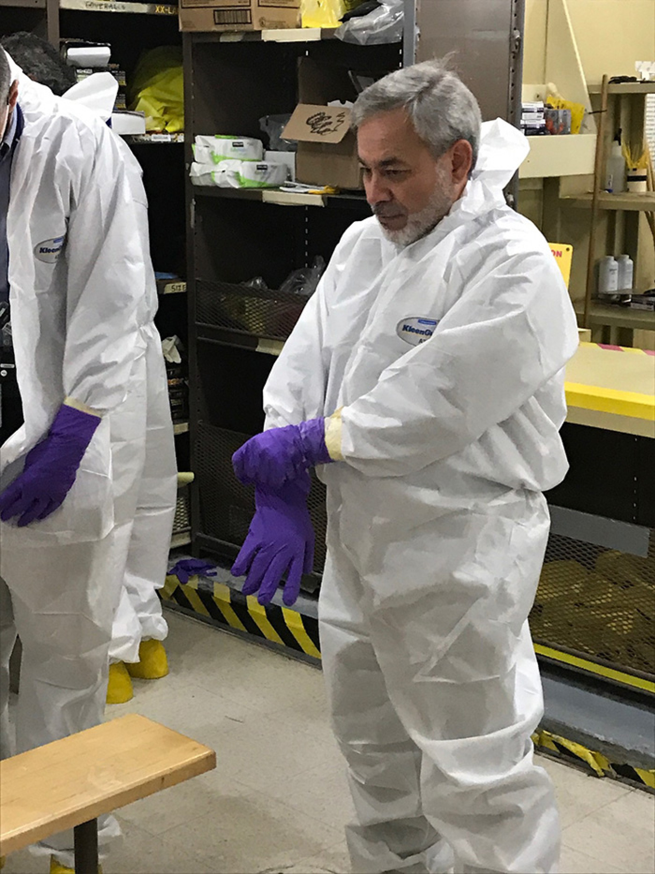 After donning the appropriate protective clothing, Deputy Energy Secretary Dan Brouillette prepares for a tour of the 324 Building, which sits atop a contaminated waste site.