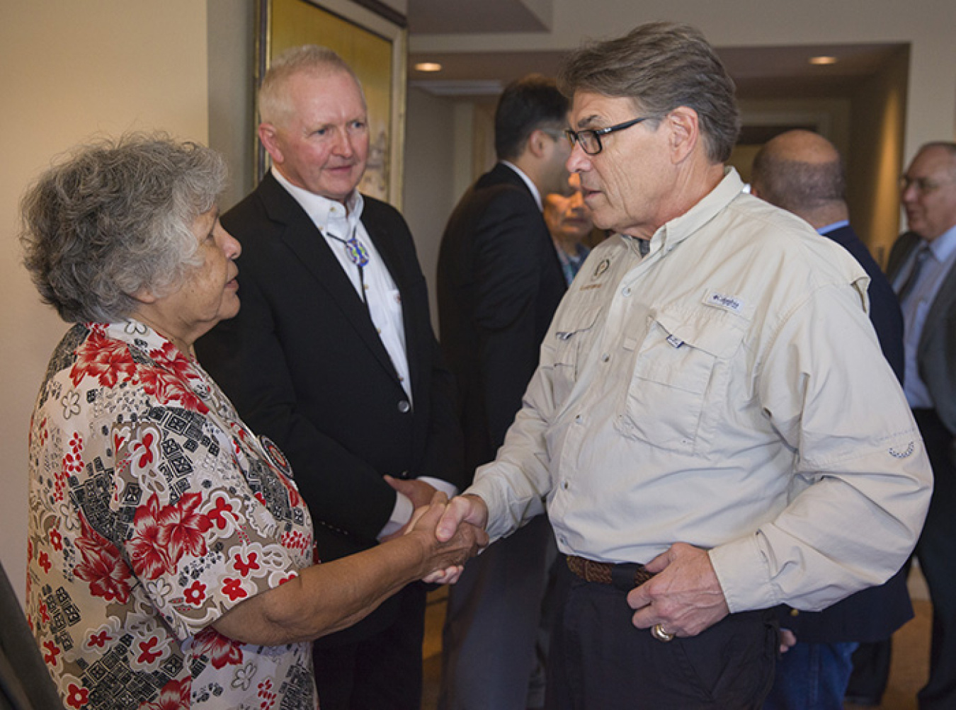 Energy Secretary Rick Perry shakes hands with Chairwoman Mary Jane Miles of the Nez Perce Tribe Executive Committee.