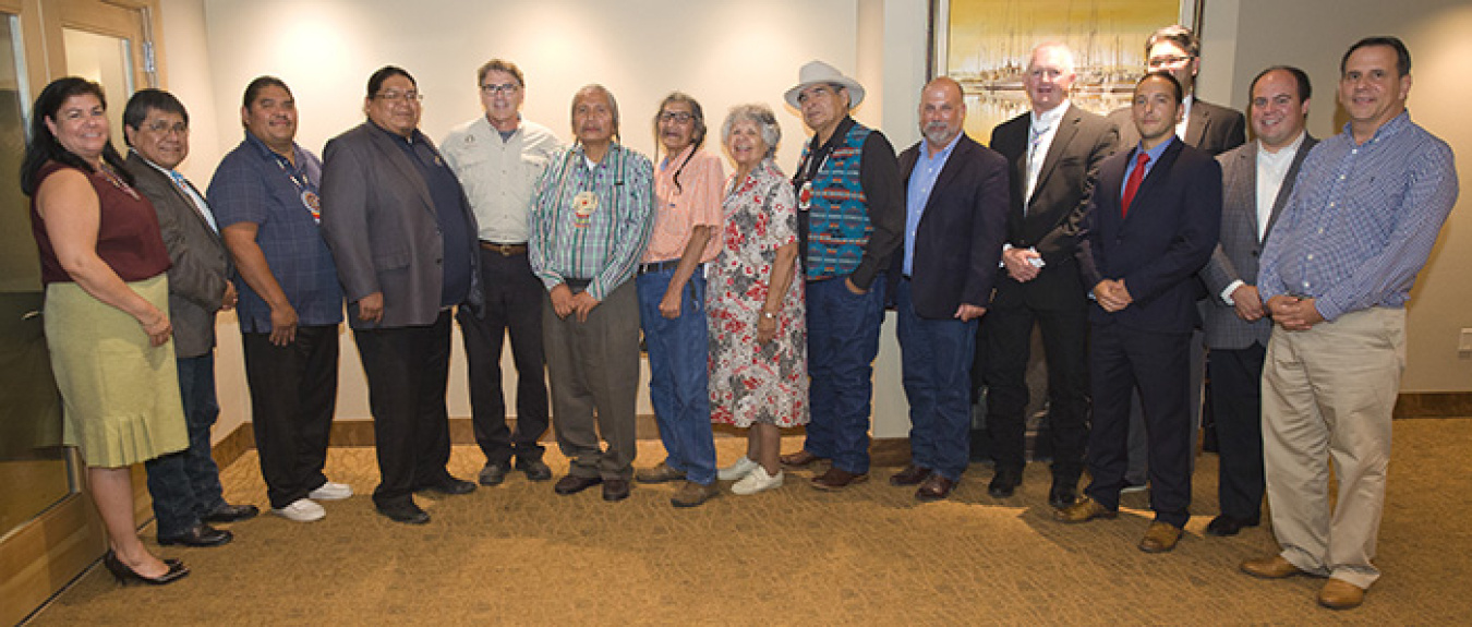 Energy Secretary Rick Perry, fifth from left, gathers with Tribal leaders and DOE representatives following a meeting in Richland, Wash.