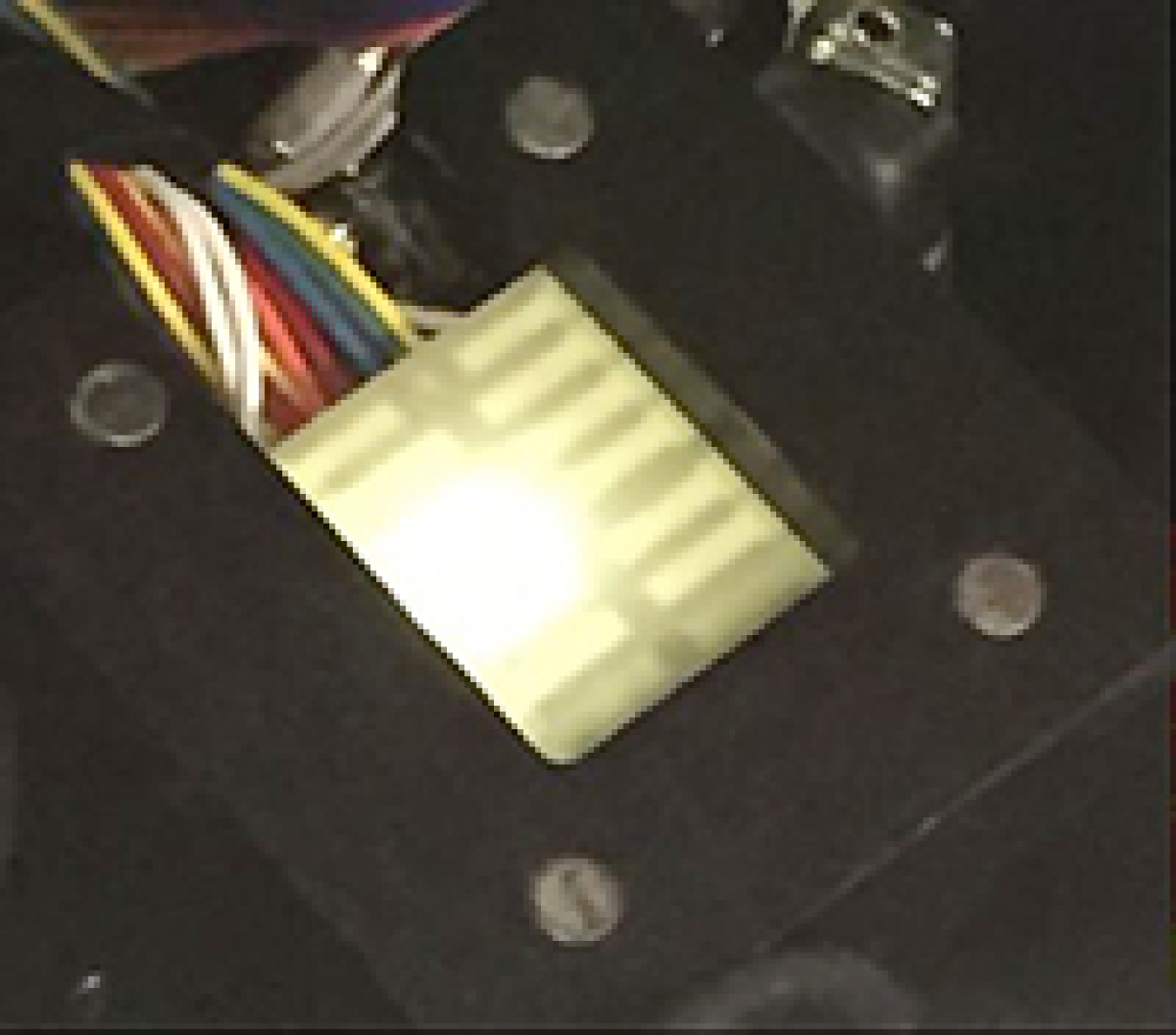 A white OLED with the scattering layer attached to the back of the substrate.