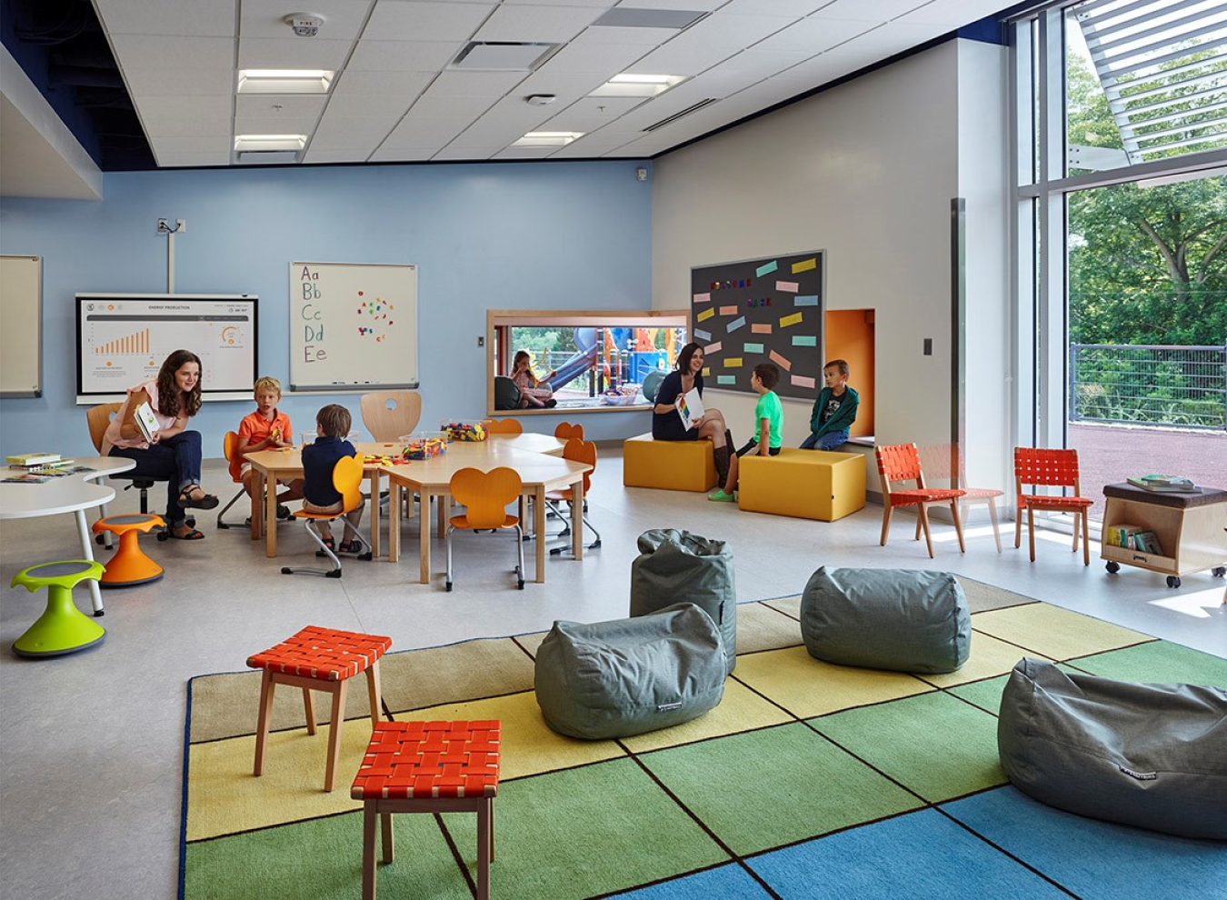 Classroom with two teachers and five children in it.