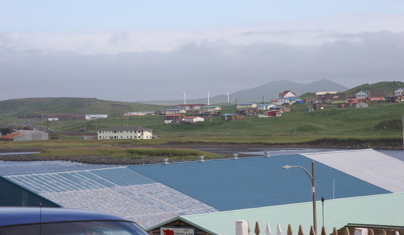 Photo of a rooftop with solar panels on it.