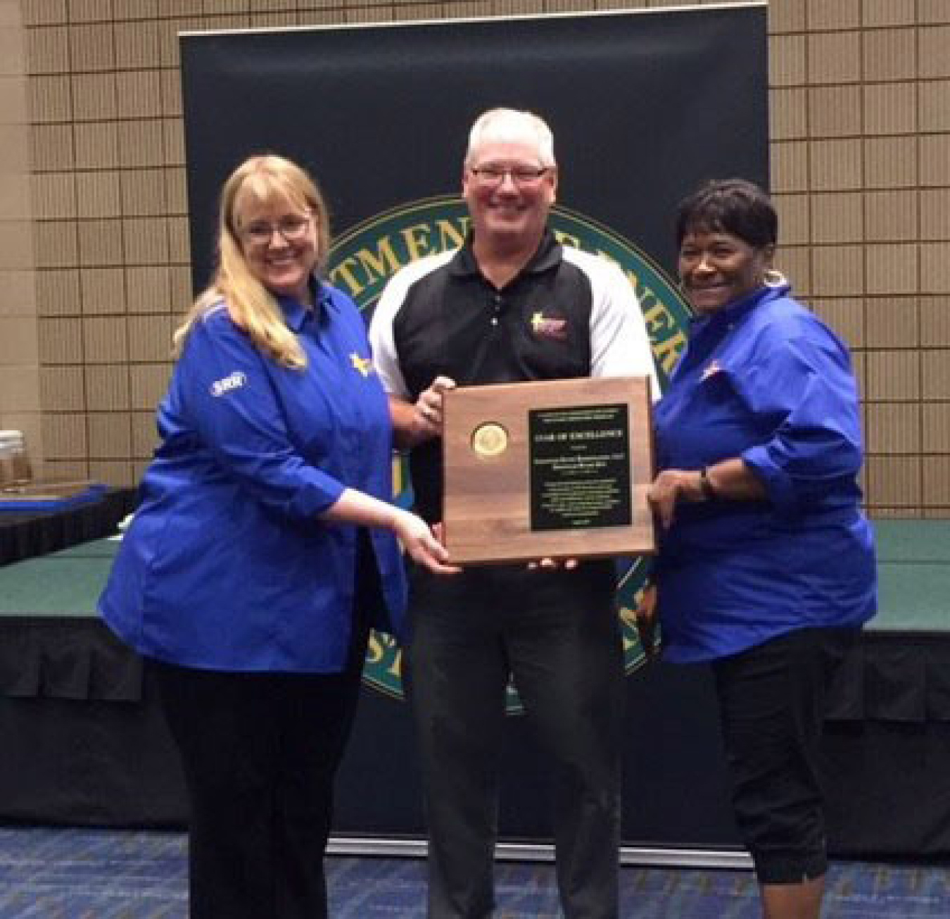 SRR Tank Farm Facility Support Operator Arlene Williams, right, and SRR Training/Media Technologies Support Team Senior Instructor Penny Miller attend the 2017 Safety+ Symposium in New Orleans. They accepted the Star of Excellence award on behalf of SRR.