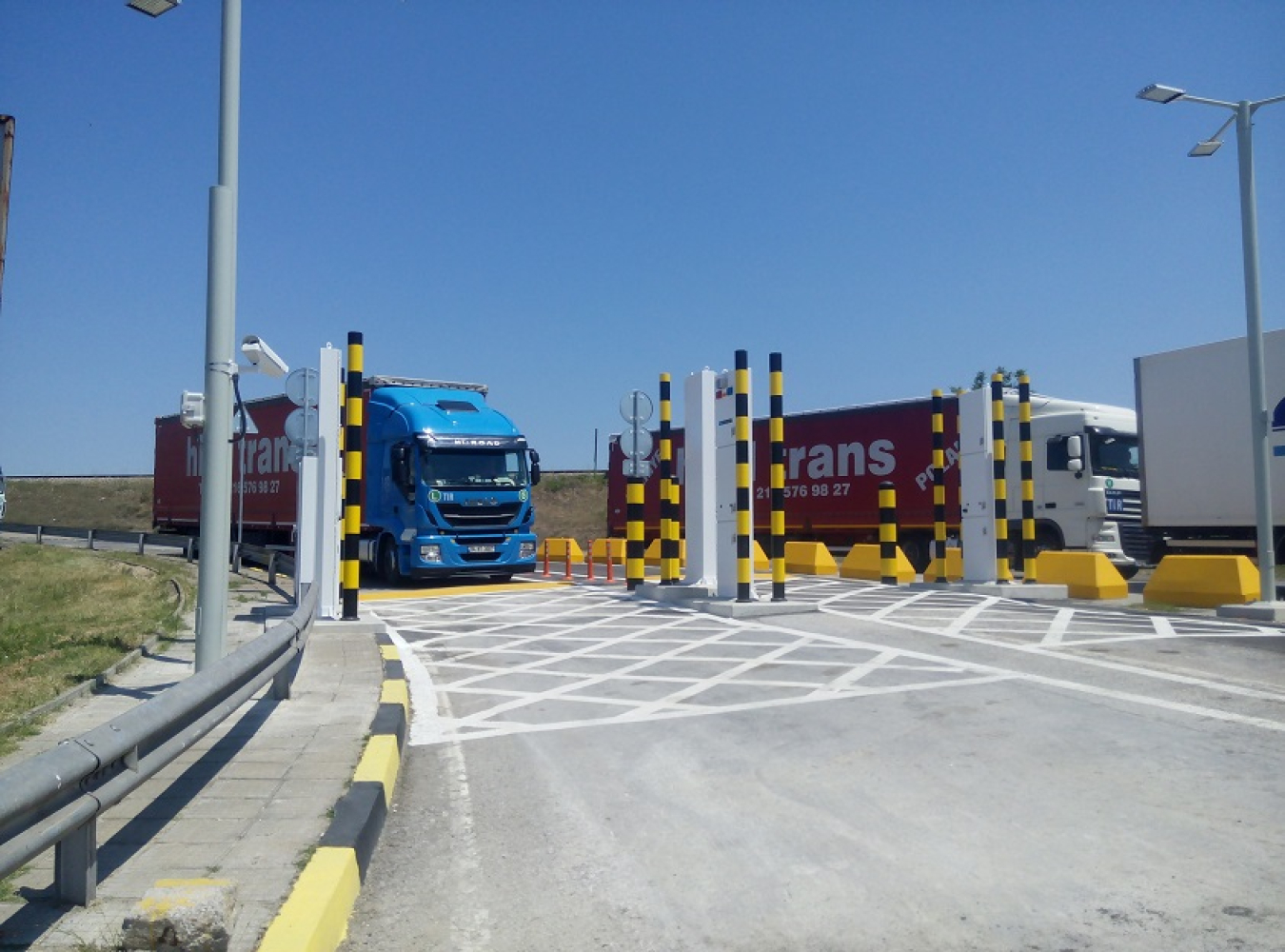 A truck approaches a radiation monitoring portal