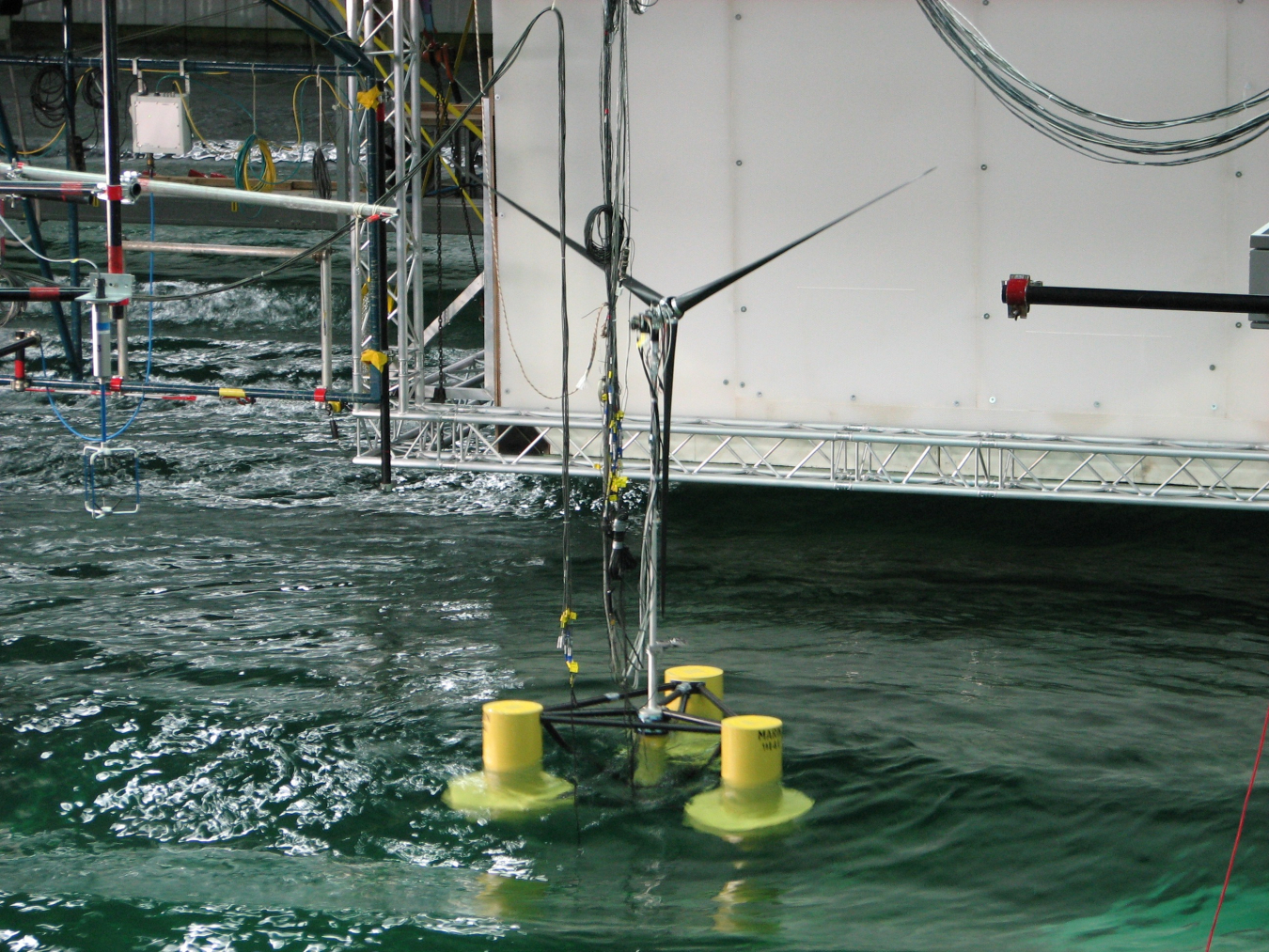 A semisubmersible offshore wind turbine in a research tank.