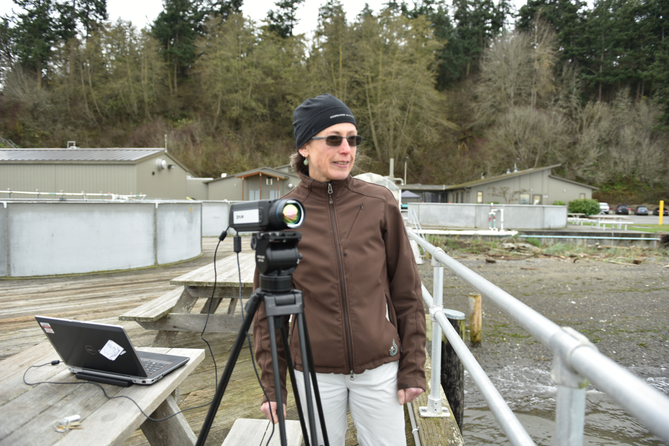 Shari Matzner stands alongside a ThermalTracker video camera.