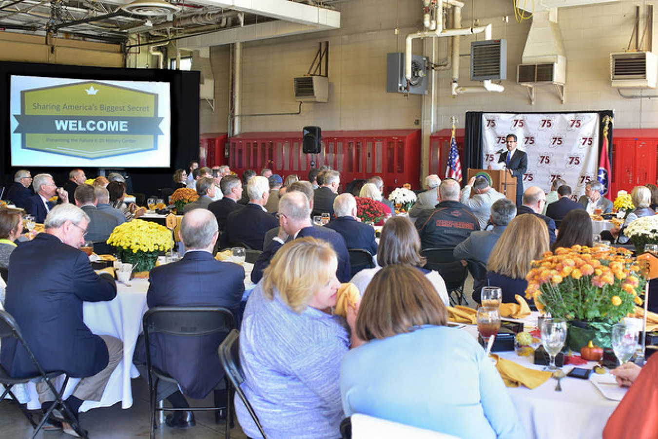 Employees, state legislators, stakeholders, local representatives, congressional staff members, and signatory and consulting party members attend a luncheon and preview of the K-25 History Center. Afterward, the attendees viewed plans for the facility.