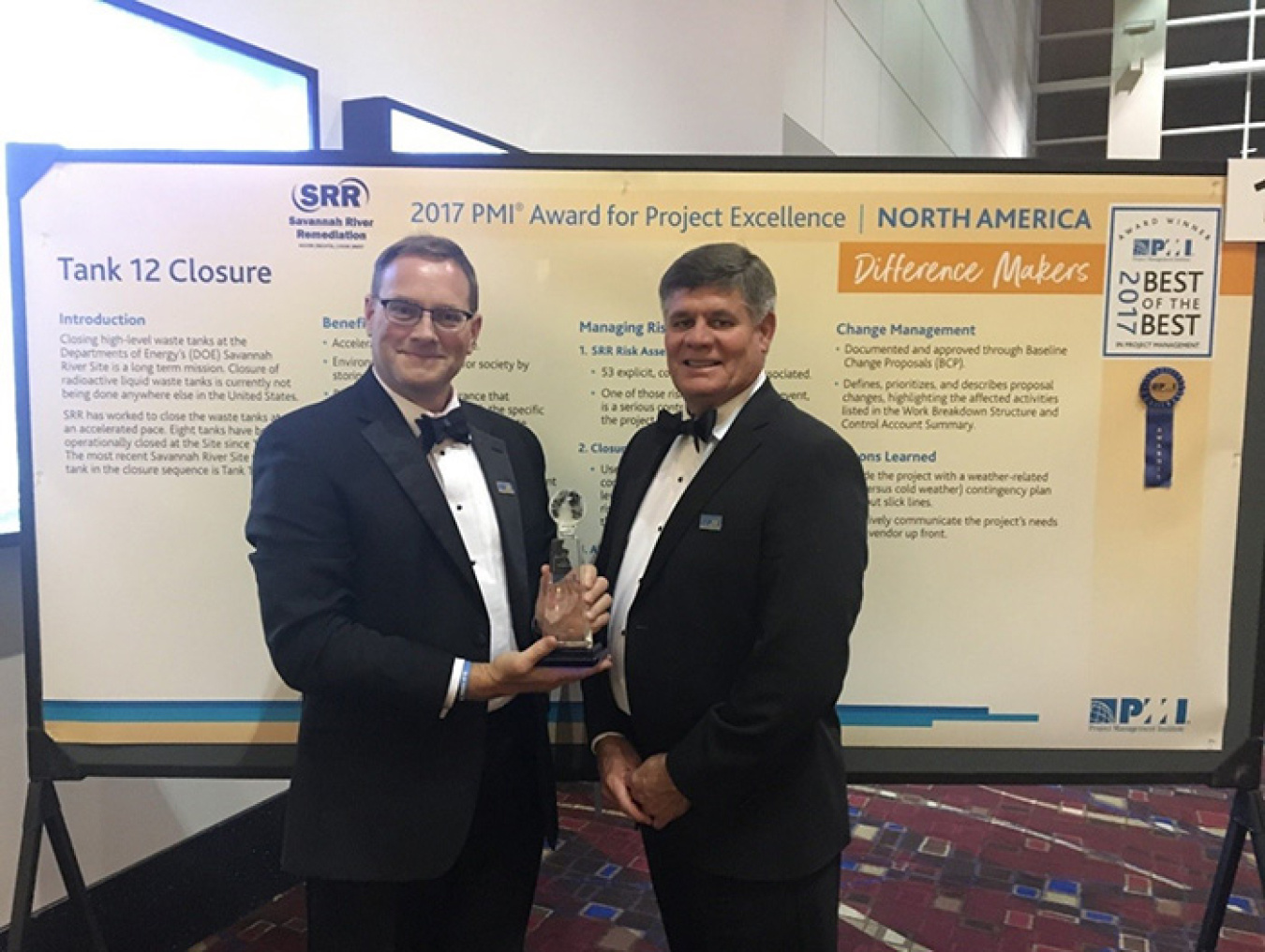 Savannah River Remediation (SRR) Chief Operating Officer Mark Schmitz, left, and SRR President and Project Manager Tom Foster accept the Award for Project Excellence at the Project Management Institute’s Global Project Management Conference in Chicago.