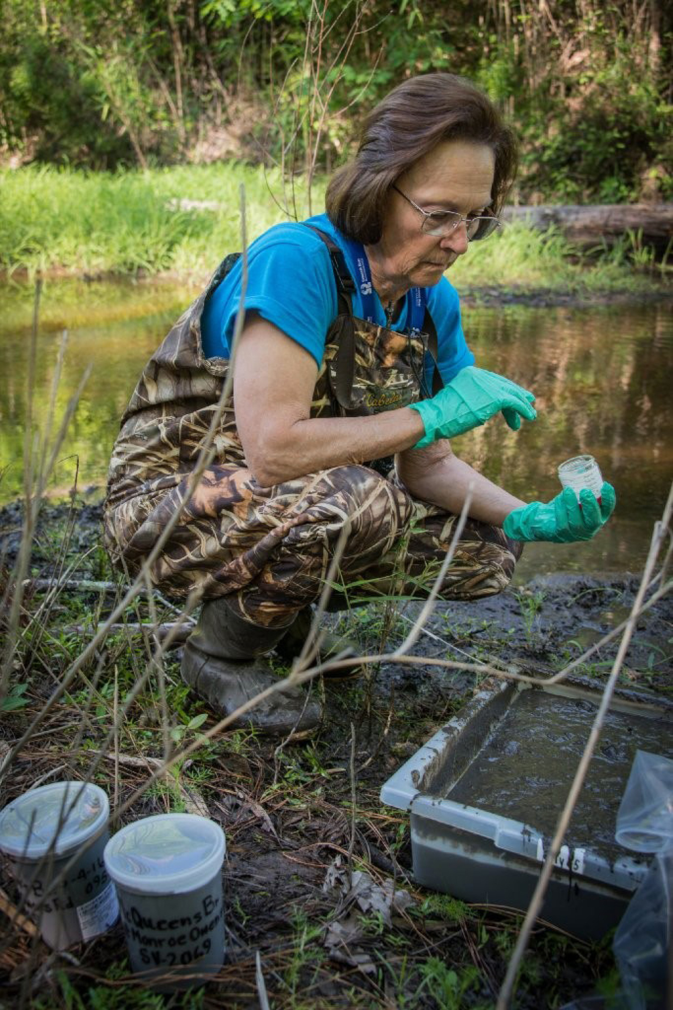Savannah River Nuclear Solutions employee Rebecca Sturdivant collects sediment samples at the Savannah River Site.