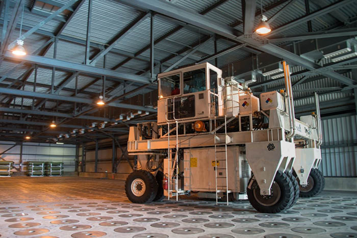 The Shielded Canister Transporter enters the glass waste storage facility.
