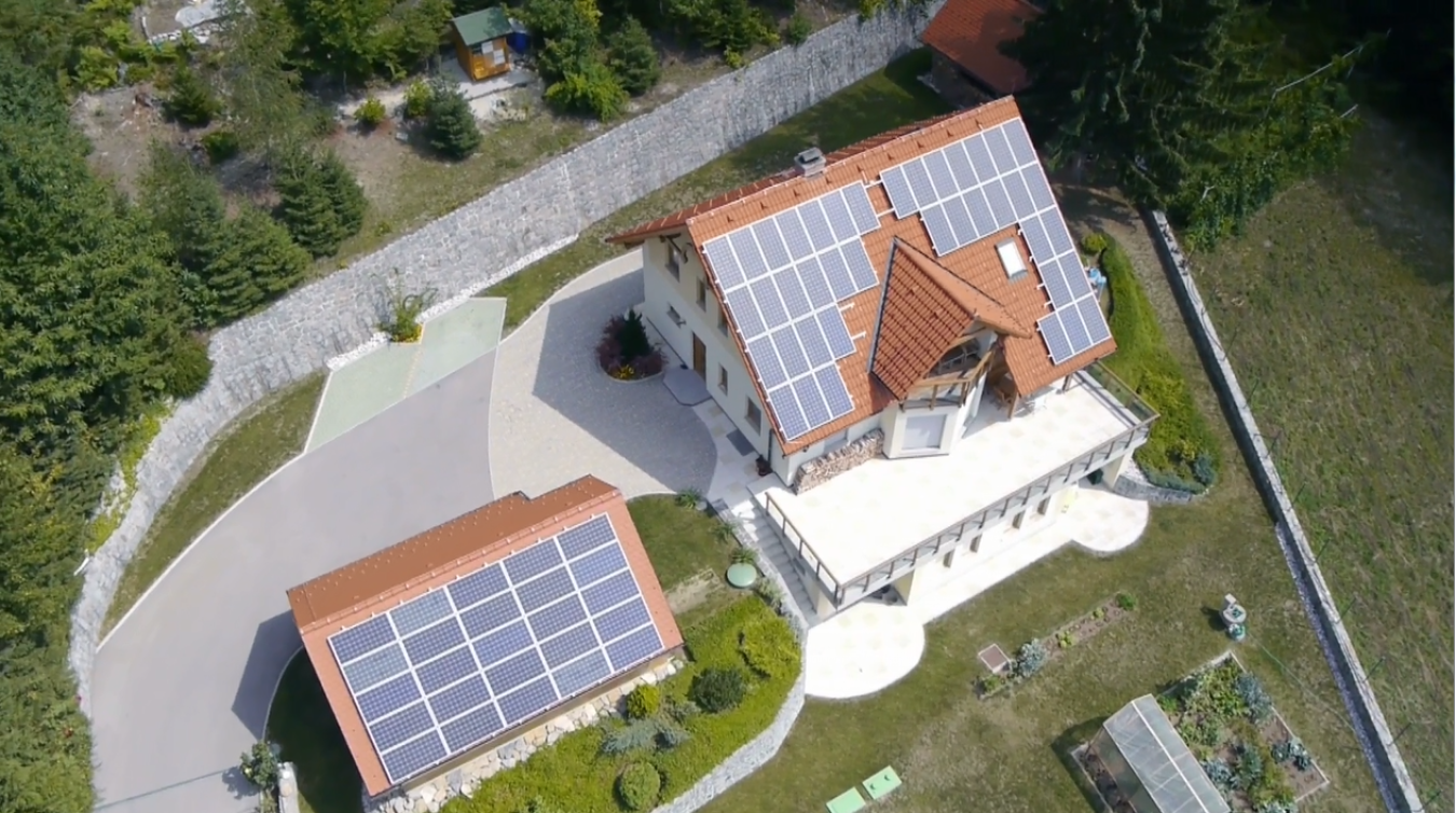 aerial rendering of home and garage with solar