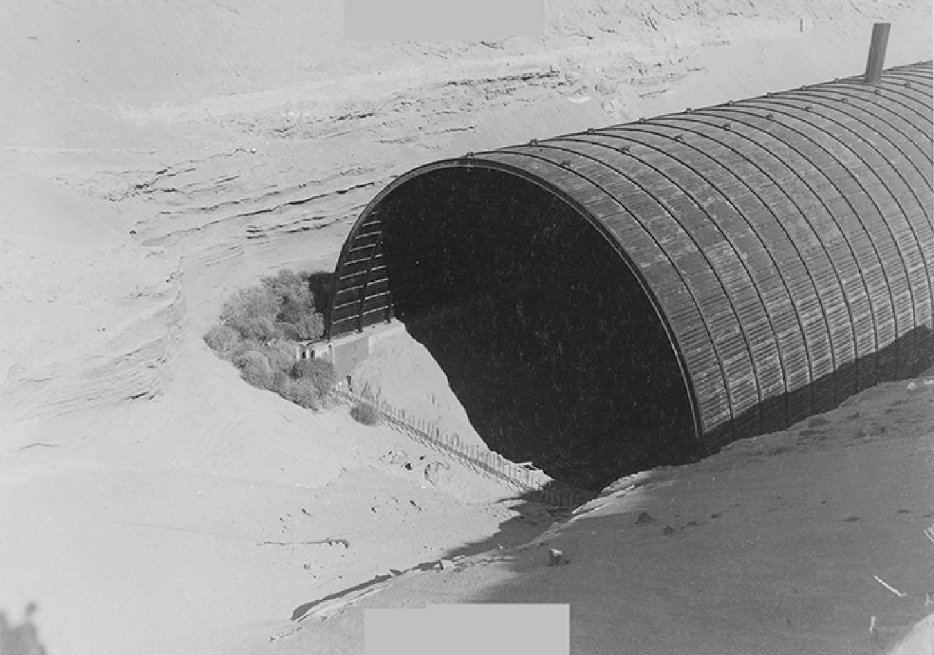 Tunnel 2 at the Plutonium Uranium Extraction Plant (PUREX) was constructed of steel and concrete and contains 28 rail cars containing radiologically contaminated plutonium processing equipment.