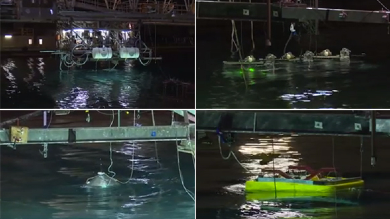 1/20th-scale WEC prototypes in the Navy’s Maneuvering and Seakeeping (MASK) Basin, at Carderock, Md