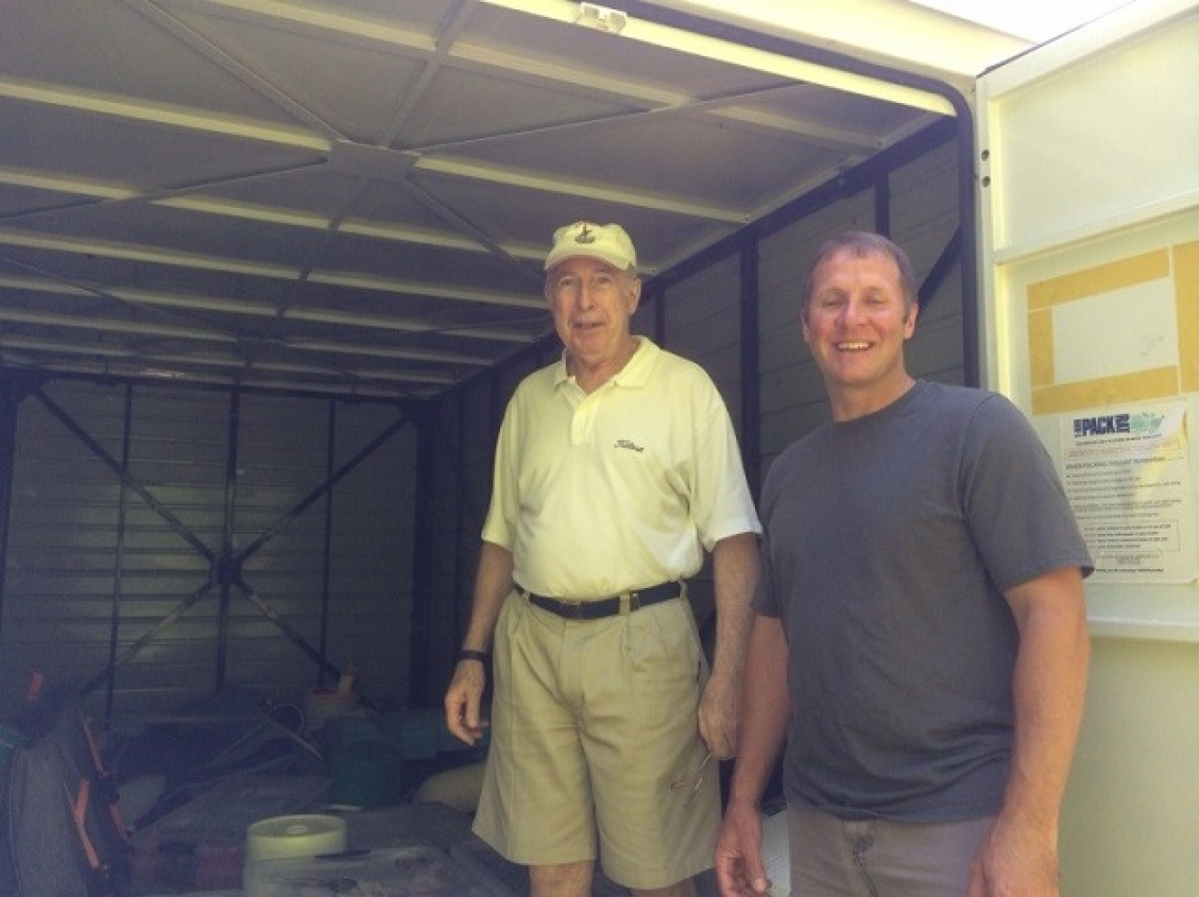 RTI principals John Rohrer and Sean Lewis with loaded container