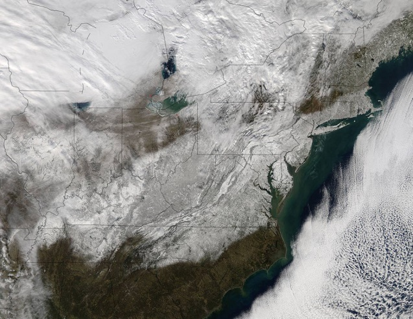 Aqua image of the eastern US after Blizzard 2016. This visible image from the MODIS instrument aboard NASA’s Aqua satellite on Jan. 24 at 1830 UTC (1:30 p.m. EST) shows post-storm snow on the ground across eastern United States.
