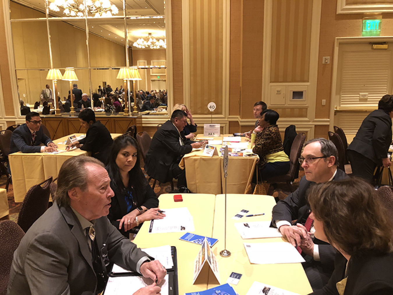 Don Chapman and Heather Collins of Cayuse Technologies, a Tribal-owned business of the Confederated Tribes of the Umatilla Indian Reservation, discuss their interest in contracting with EM.