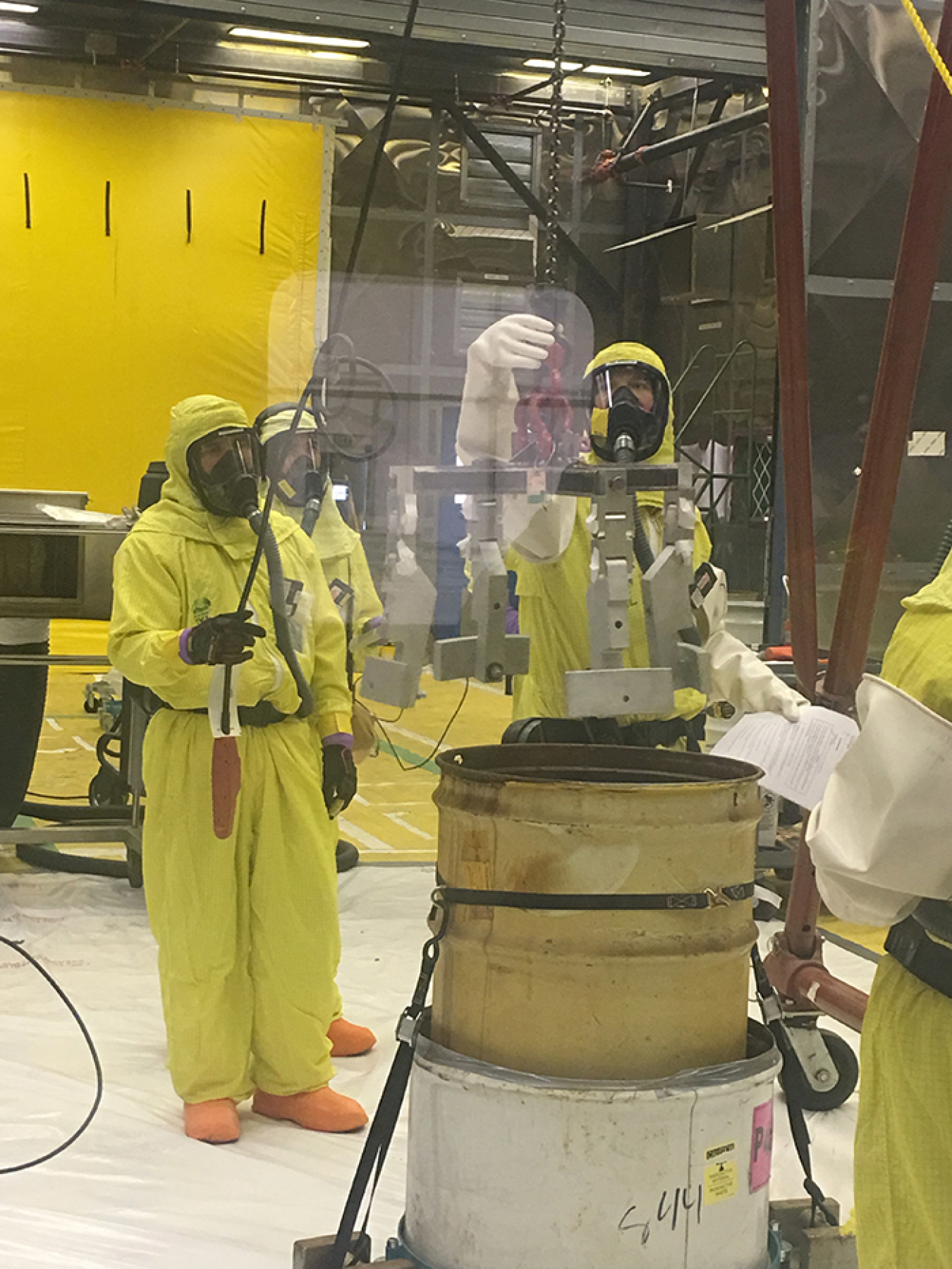 Drum liners containing the unremediated nitrate salt waste were pulled from the original containers and repacked into new 55-gallon drums.