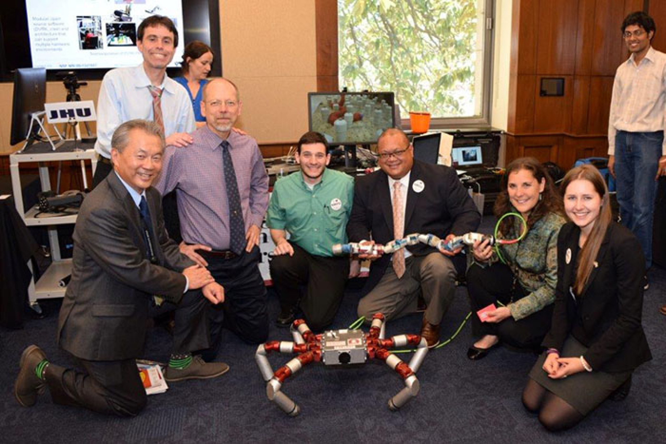 Showing Carnegie Mellon University's modular robots in snake- and spider-like configurations during a briefing to the Congressional Robotics Caucus.
