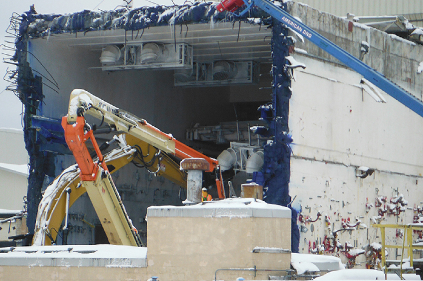 The first of four in-cell Vitrification Facility coolers is lowered to the floor as part of the removal process.